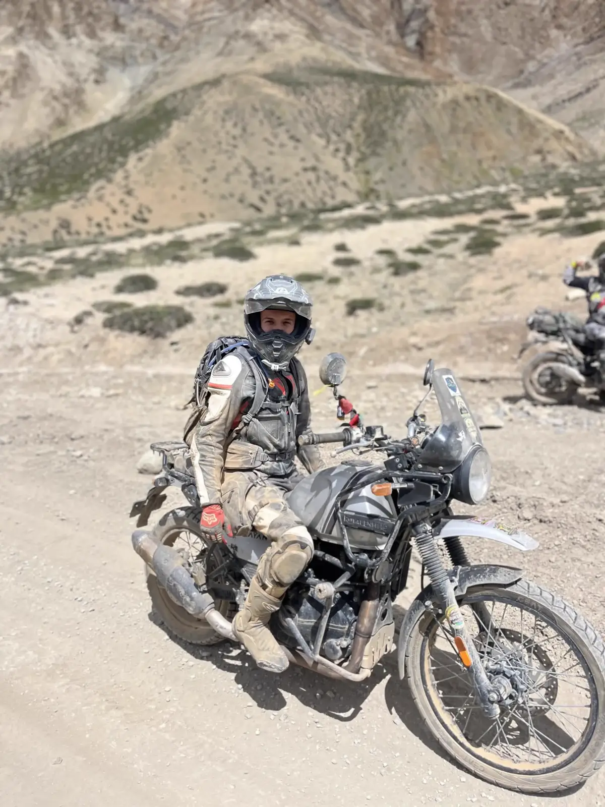 Rider on Khardung La pass with Royal Enfield Himalayan